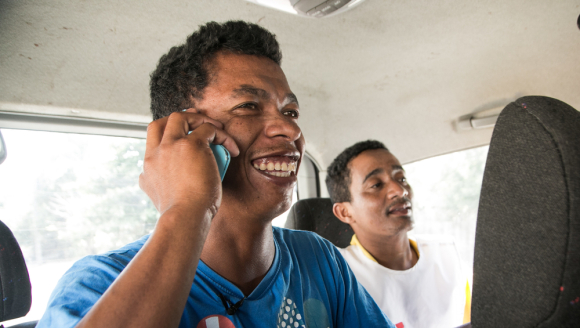 TOAMASINA, MADAGASCAR - Andrinjaka RAFAMANTANANTSOA (left), 28, was just released from the plague triage and treatment centre where had been cared for since 11 October. ANDRINJAKA is a mason. Due to fears of being rejected by his boss and his coworkers, he has asked the MSF Health Promoters to come with him to his workplace in order to meet them and explain them that he’s no longer a danger to his team. ANDRINJAKA greets them one last time.