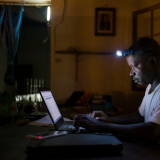 Jean Liyolongo, Head of Monga Intervention, works late into the night at the MSF base, Monga, in Bas-Uele Province, Democratic Republic of Congo.