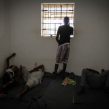 Men in the detention centre cells.

On September 2nd, 276 people were brought by the Libyan coast guard to Khoms (120 km east of Tripoli). They were then transferred to detention center where MSF works. Reportedly, they were in two rubber coats, one stopped due to engine failure, while the other boat continued to navigate for several hours before deflating and sinking. Survivors told MSF teams that over a hundred people died in the shipwreck.